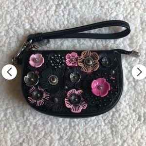 ISO !!!! Looking for this !!! Coach tea rose wristlet small ! DO NOT BUY